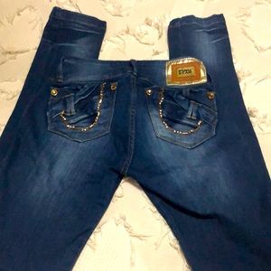 Size 1 pink star going out jeans.